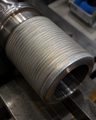 Hardfaced sleeve overlay before finish machining