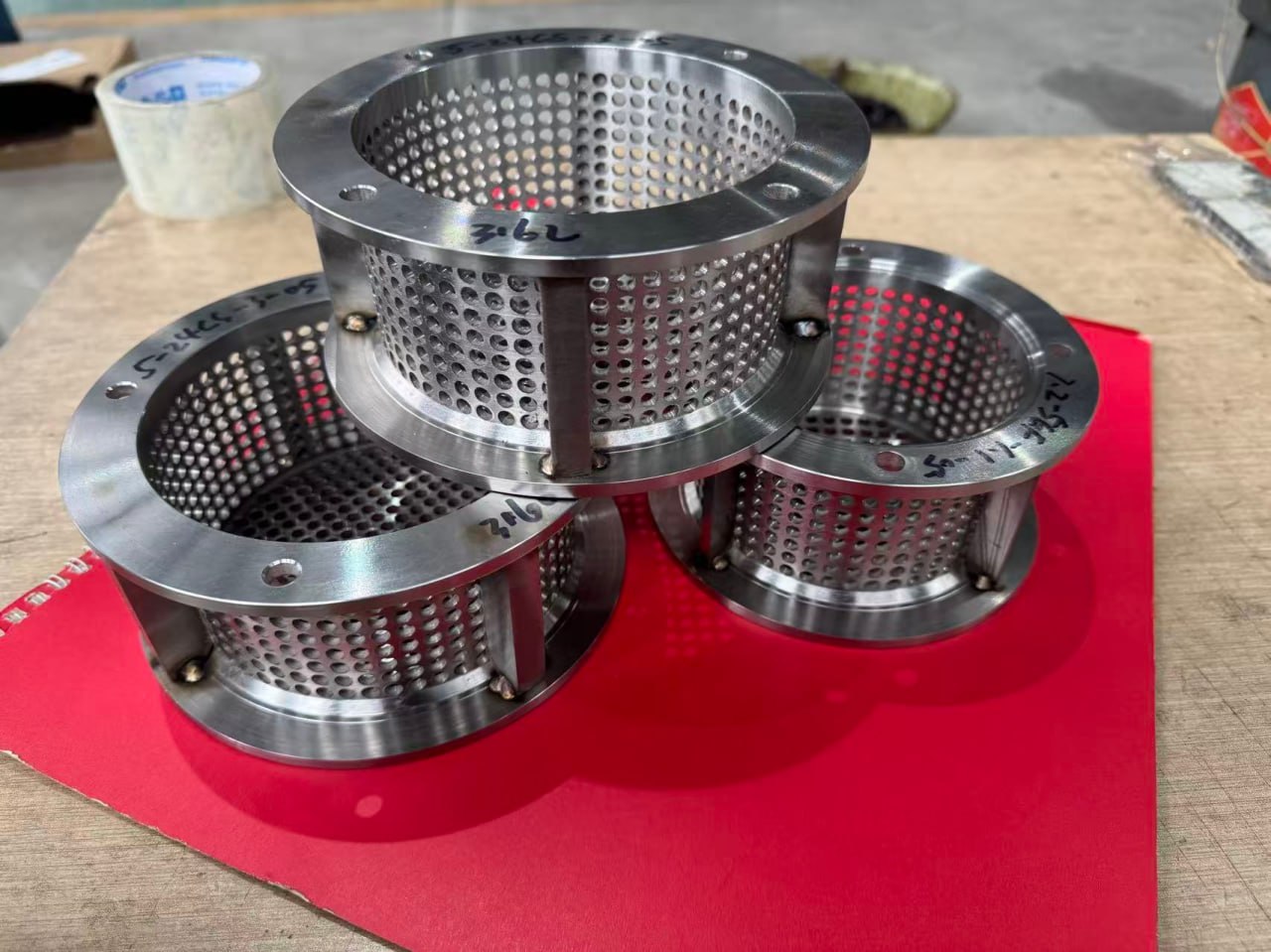 Small batch of perforated strainer baskets for pump and valve applications